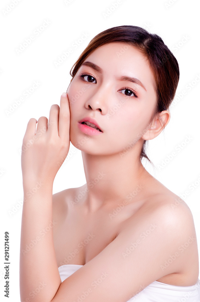 Short hair asian young beautiful woman smiling and touching her face, isolated over white background. natural makeup, SPA therapy, skincare, cosmetology and plastic surgery concept Short hair asian young beautiful woman smiling and touching her face, isolated over white background. natural makeup, SPA therapy, skincare, cosmetology and plastic surgery concept
