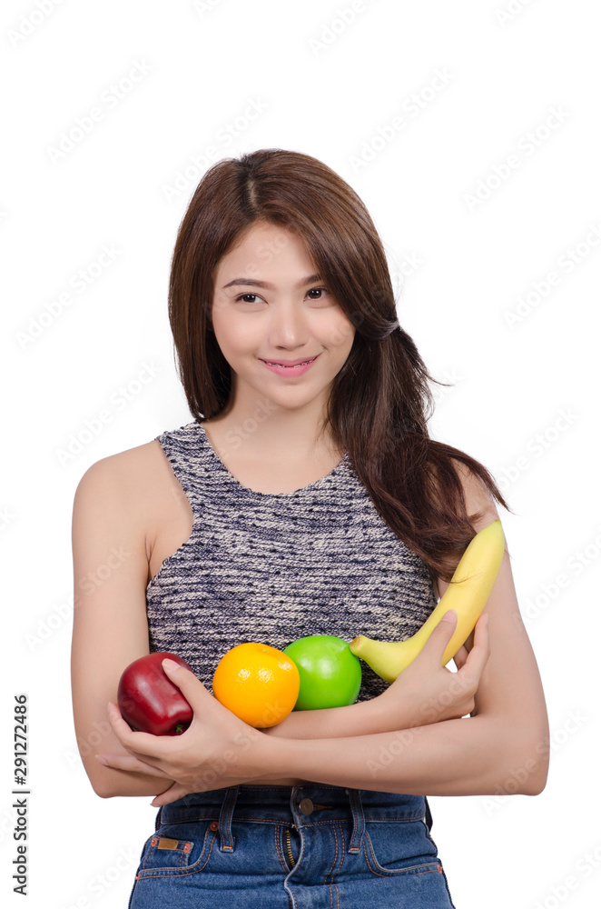 Asian young healthy woman smiling and holding mixed fruits, natural makeup, isolated over white background. Asian young healthy woman smiling and holding mixed fruits, natural makeup, isolated over white background.
