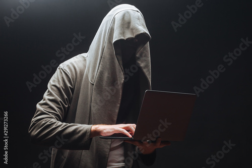 The hacker is hacking the system at night