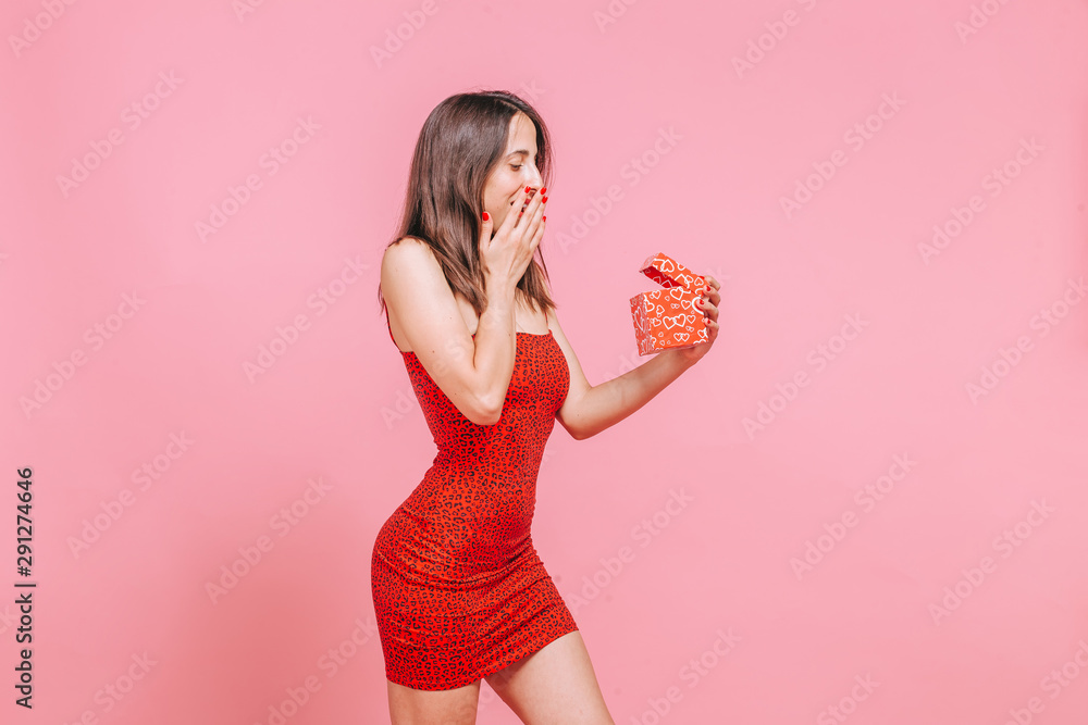 The girl received the gift is happy The girl received the gift is happy