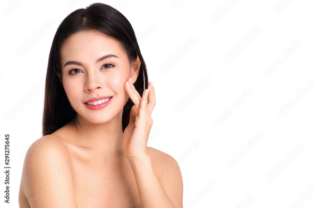 asian young beautiful woman smiling and touching her face, isolated over white background. natural makeup, SPA therapy, skincare, cosmetology and plastic surgery concept