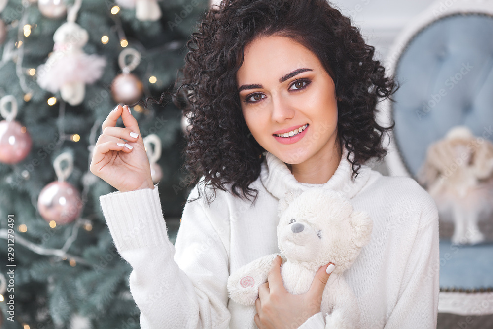 Young attractive woman at christmas background Young attractive woman at christmas background
