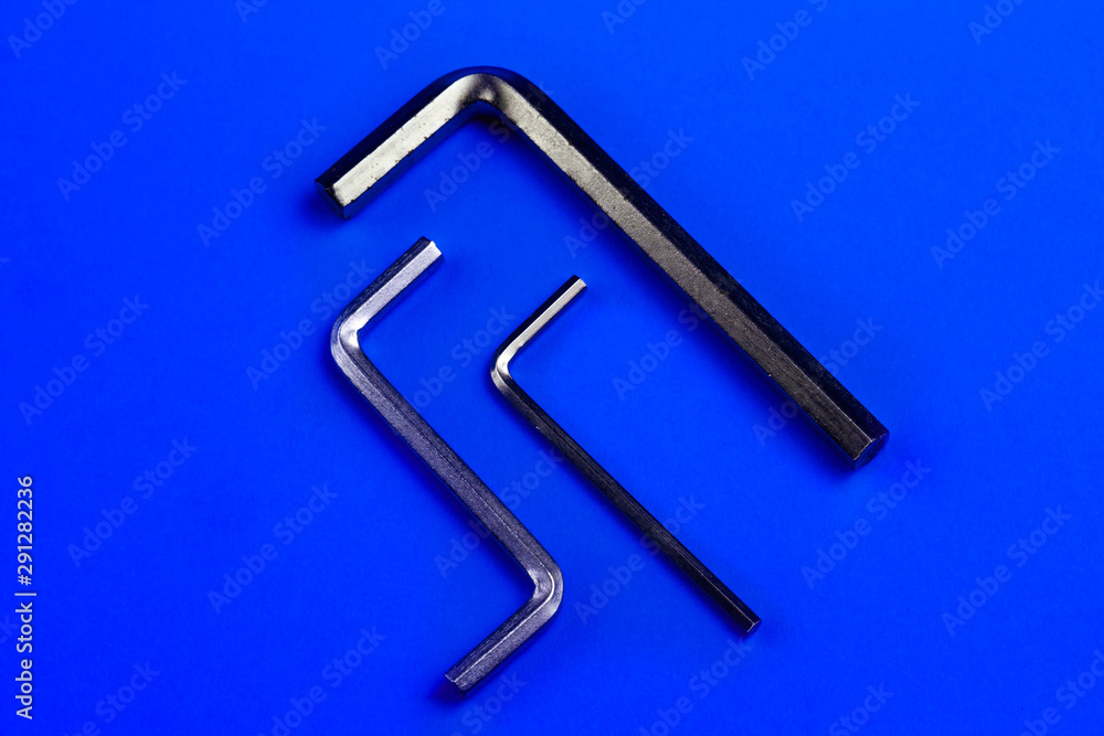 steel hex keys on a plain background. copy space steel hex keys on a plain background. copy space