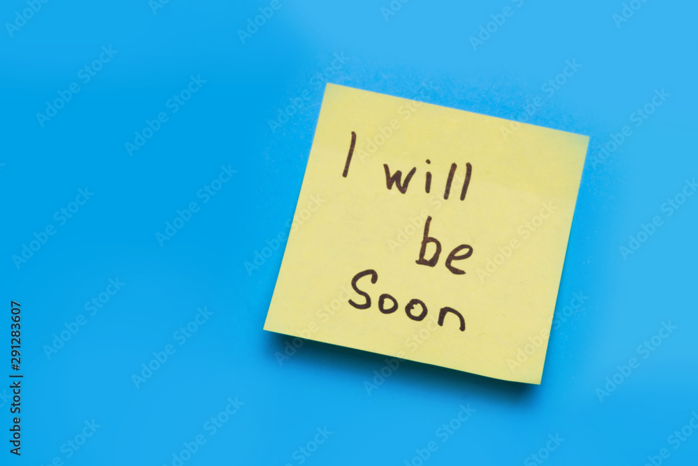 yellow sticker on a blue background. copy space yellow sticker on a blue background. copy space