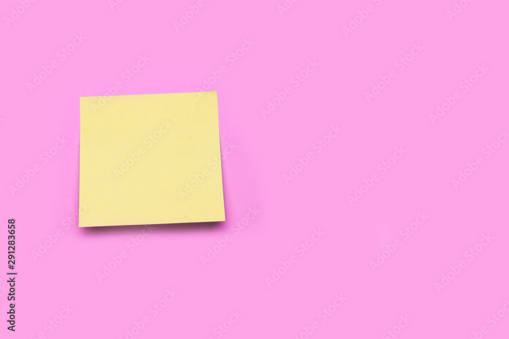 yellow sticker on a blue background. copy space yellow sticker on a blue background. copy space