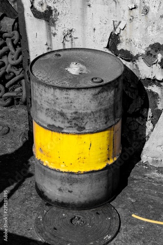 barrel with warning sign