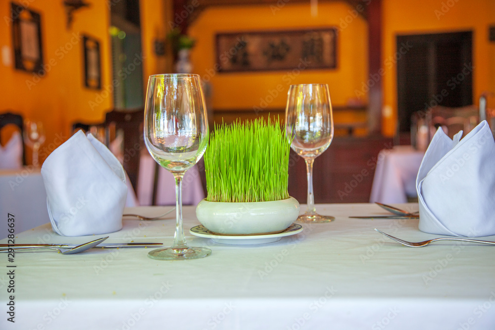 outdoor restaurant, clean plates on the table outdoor restaurant, clean plates on the table