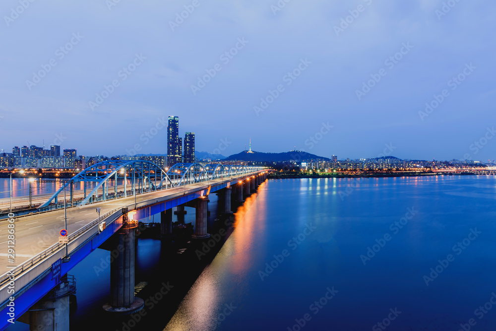 Twilight at Dongjak Bridge and Han river in Seoul City , South Korea