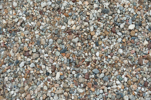 Close-up of multicolored pebbles for use in wallpaper, texture, design, pattern and backgrounds. Horizontal shot.