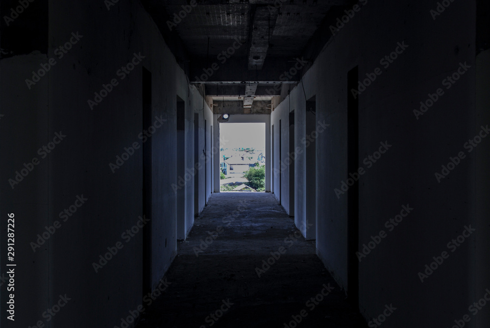 Dark corridor of abandoned building