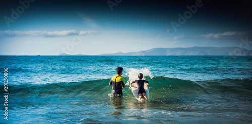 Photography Boy surfing on the Mediterranean island, Greece