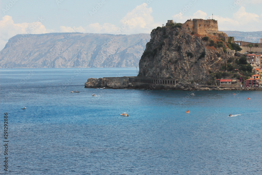 the sea and the castle of Scilla, a city located on the tyrrhenian sea