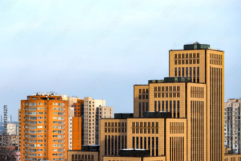 View of the big city, tall yellow buildings, towers and skyscrapers in the downtown of Dnipro city, Dnepropetrovsk Ukraine.