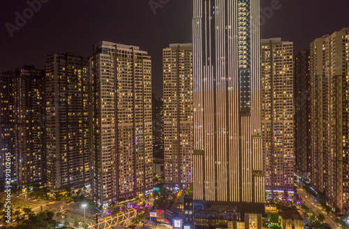 Massive Modern High Density  High Rise Buildings at night with lights on