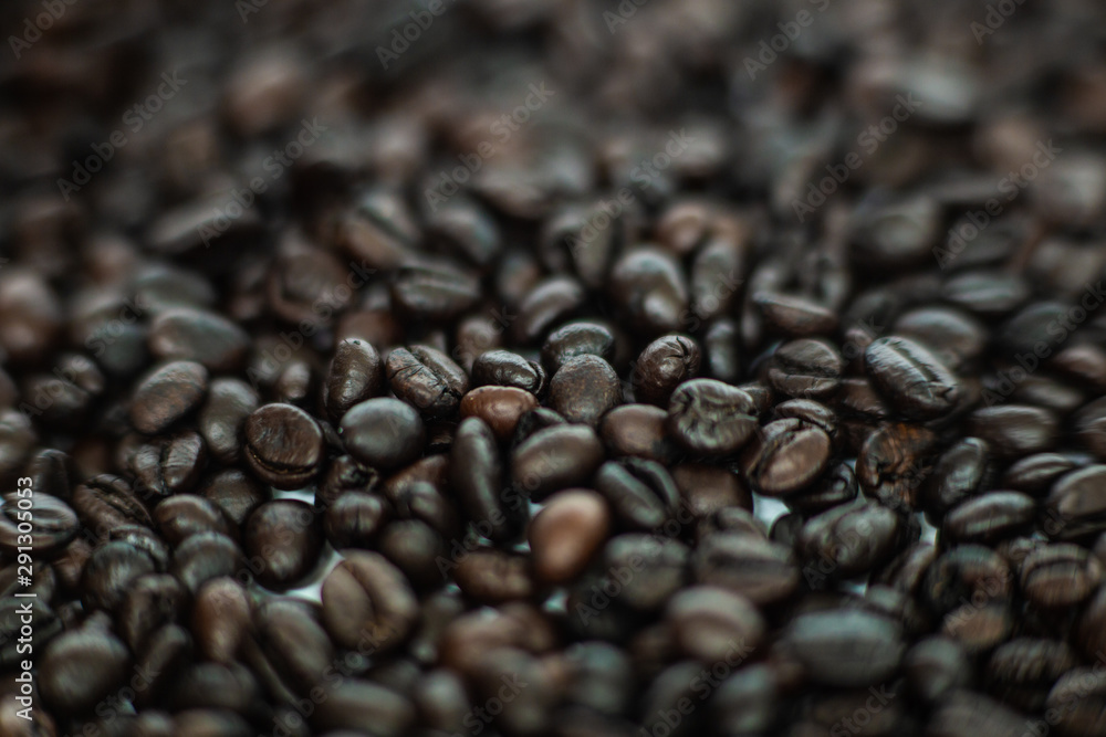 Roasted dark brown coffee bean cloe up Roasted dark brown coffee bean cloe up