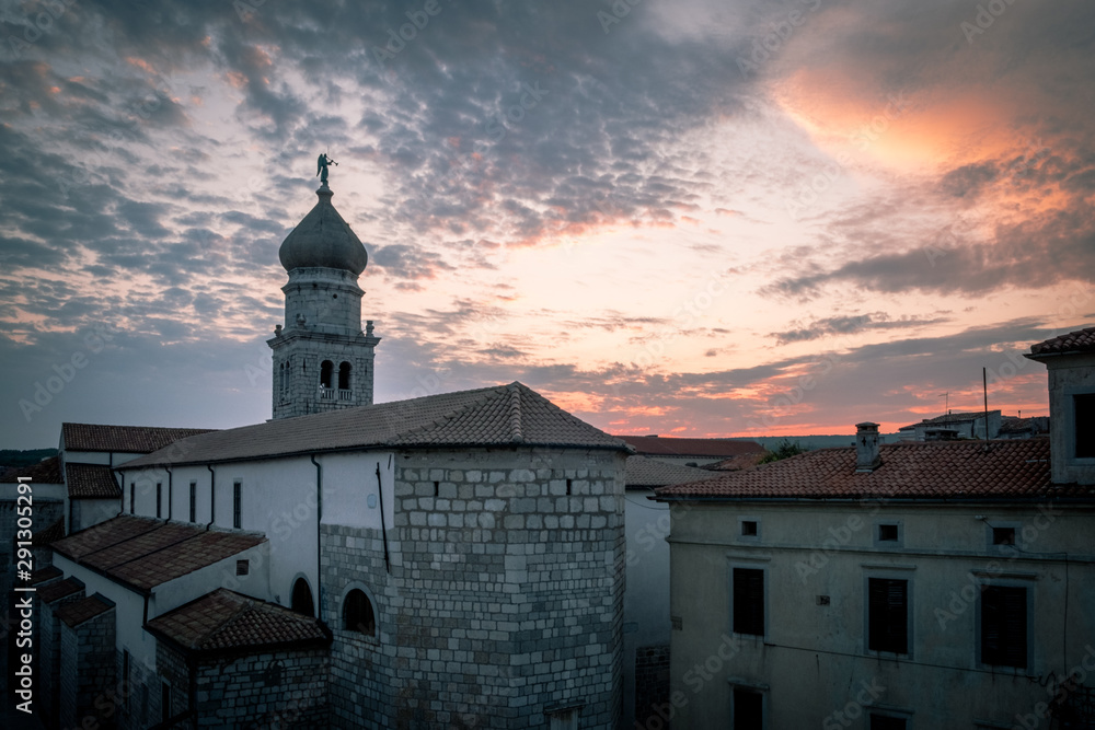 Sunset over the medieval town of Krk, Croatia. 