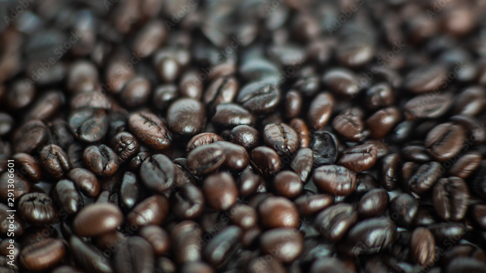 Roasted dark brown coffee bean cloe up Roasted dark brown coffee bean cloe up