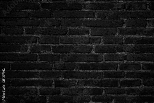 Black brick wall texture for background.