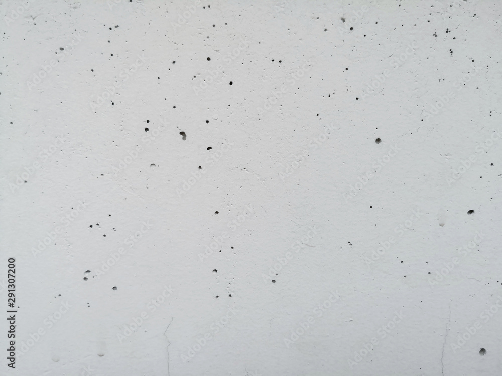 White concrete wall and air holes texture background. White concrete wall and air holes texture background.