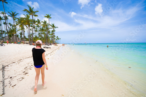 Teenage girl walking along ...