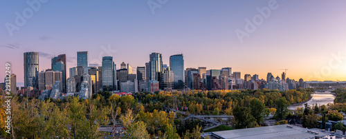 Skyline panoramic of Calgary, Alberta at sunset.