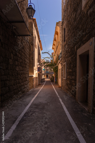 Empty narrow street in the historical centre of Porto-Vecchio, France