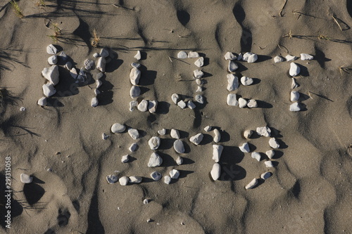 Mljet 2019 written in sand as Adriatic island vacation concept photo