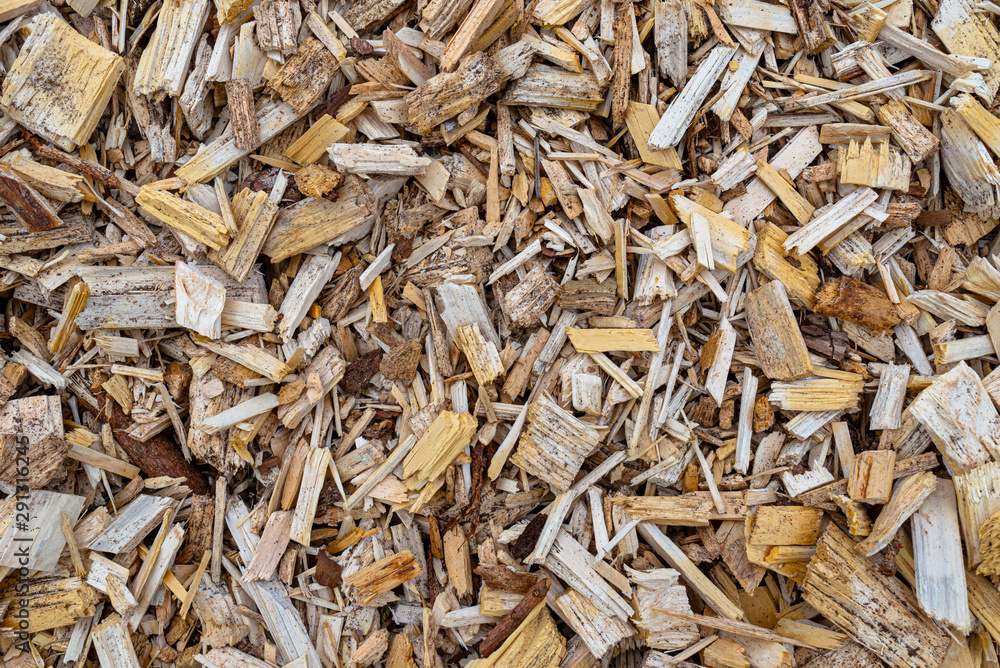 Background made of wood chips, closeup shot, wooden texture. Background made of wood chips, closeup shot, wooden texture.