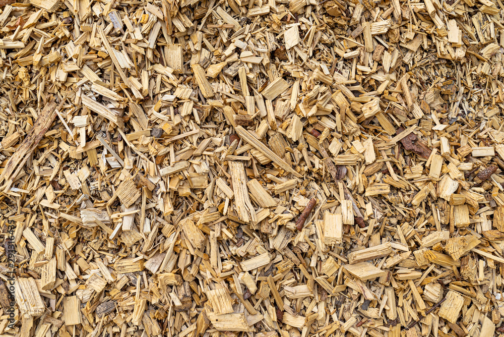 Background made of wood chips, closeup shot, wooden texture. Background made of wood chips, closeup shot, wooden texture.