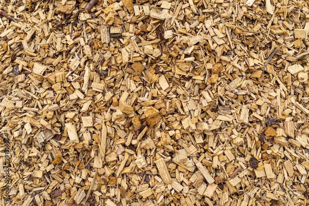 Background made of wood chips, closeup shot, wooden texture. Background made of wood chips, closeup shot, wooden texture.