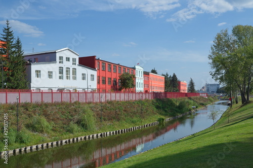 Summer view of the canal, the Kazanskaya embankment and the building of the Tula arms factory. Tula, Russia
