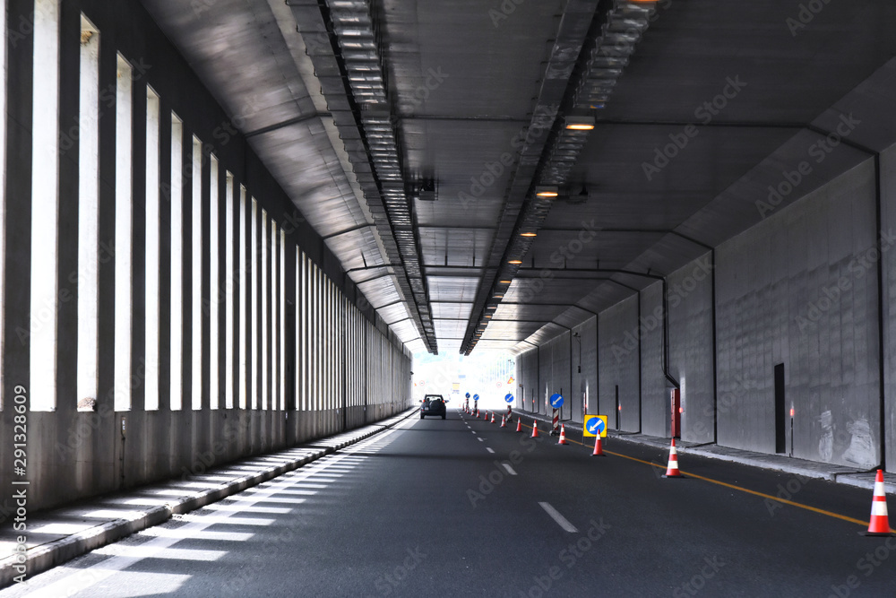 Road tunnel in mountains. Mountain road tunnel Tunnel on the highway. Automobile trip. Pathway with tunnel. Drive through the mountain Road tunnel in mountains. Mountain road tunnel Tunnel on the highway. Automobile trip. Pathway with tunnel. Drive through the mountain