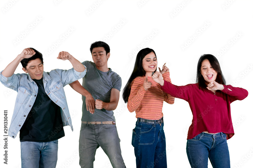 Cheerful people dancing together on studio Cheerful people dancing together on studio