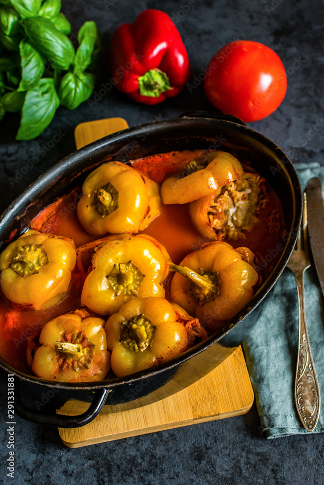 Pepper stuffed with minced meat and rice in tomato sauce. Pepper stuffed with minced meat and rice in tomato sauce.