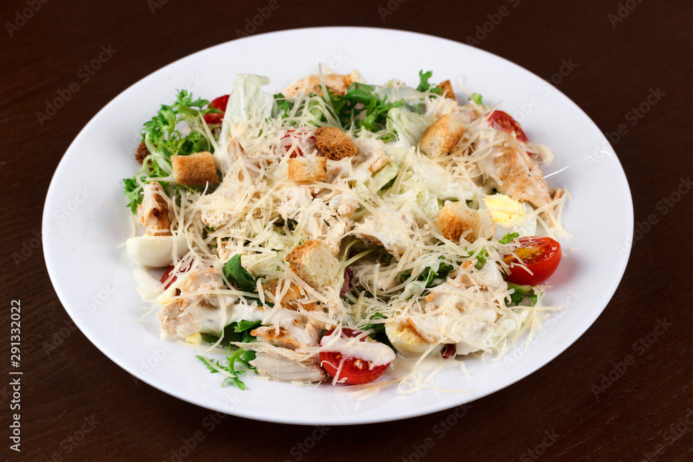 vegetable salad with cheese and chicken in a plate vegetable salad with cheese and chicken in a plate