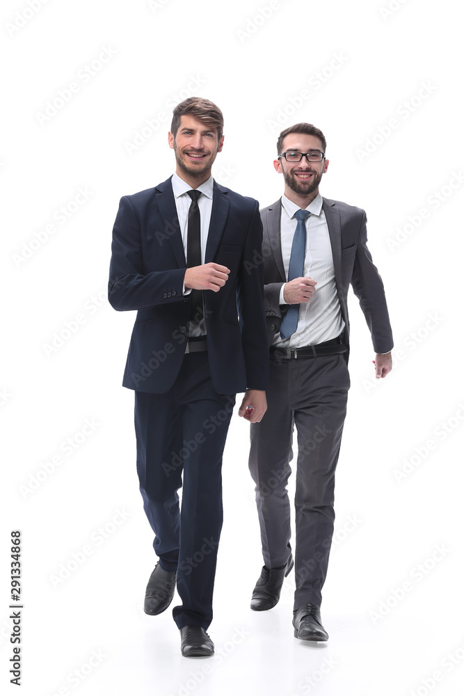 in full growth. two businessmen stepping forward. in full growth. two businessmen stepping forward.