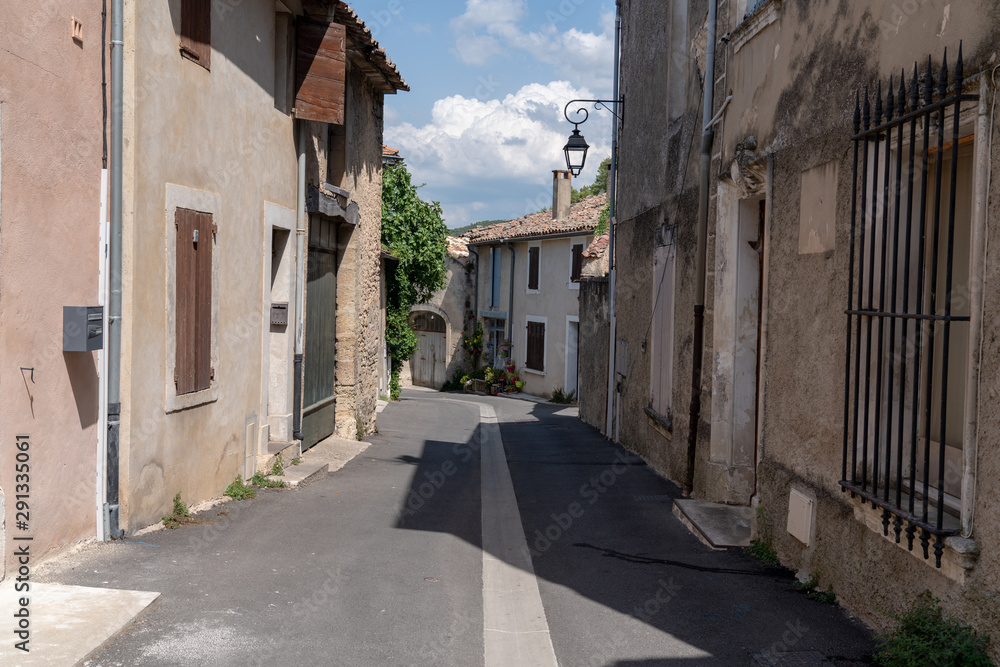 Sun light on street village of Bonnieux Provence France