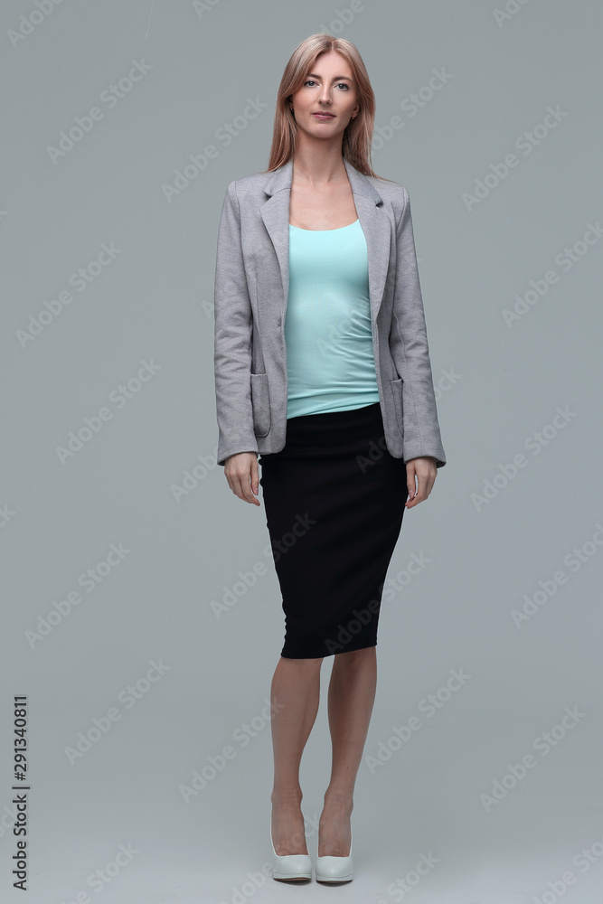 confident business woman. isolated on grey background confident business woman. isolated on grey background