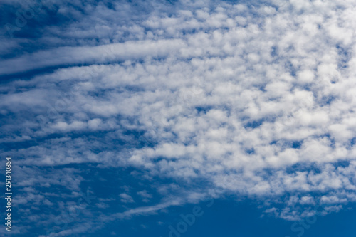 Blue sky background with clouds
