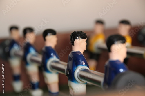 Table football and group of players