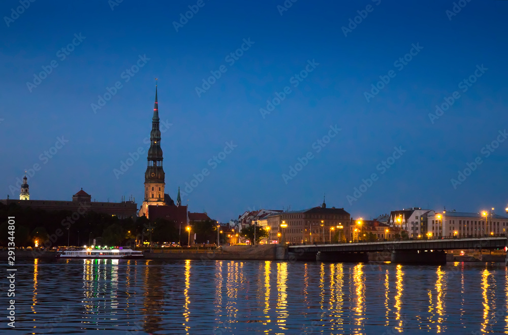 Riga, Latvia. View of the night city across the Daugava River