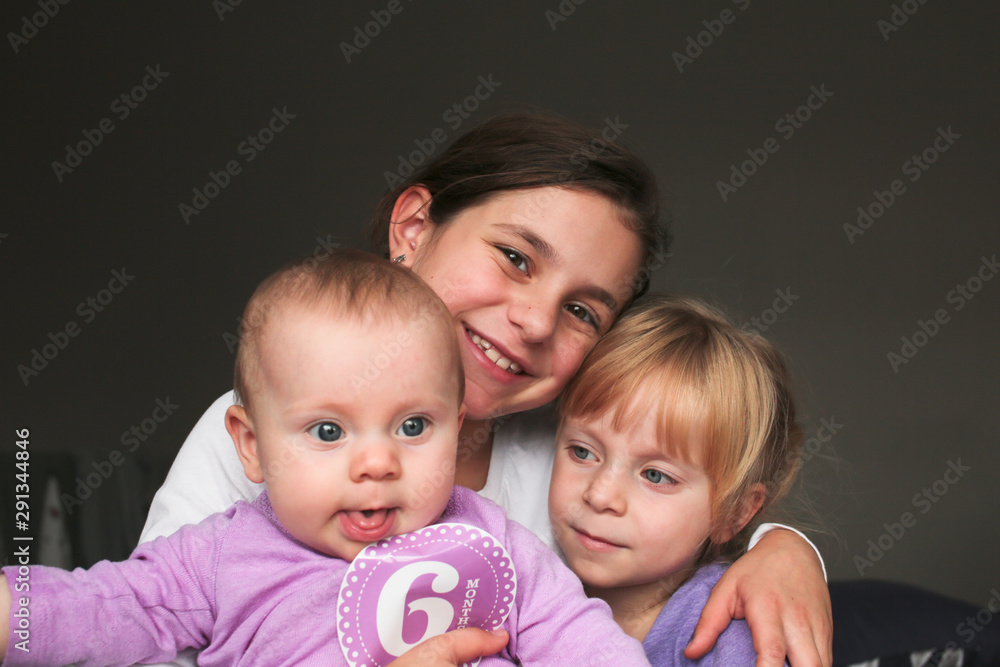 Close up Portrait of Three Beautiful Sisters, One Cute Toddler Girl , 6 Month Old Baby Girl, 7 Years Old Girl, Best Friends Forever, Happy family concept, The most Beautiful Girls, Princesses Close up Portrait of Three Beautiful Sisters, One Cute Toddler Girl , 6 Month Old Baby Girl, 7 Years Old Girl, Best Friends Forever, Happy family concept, The most Beautiful Girls, Princesses