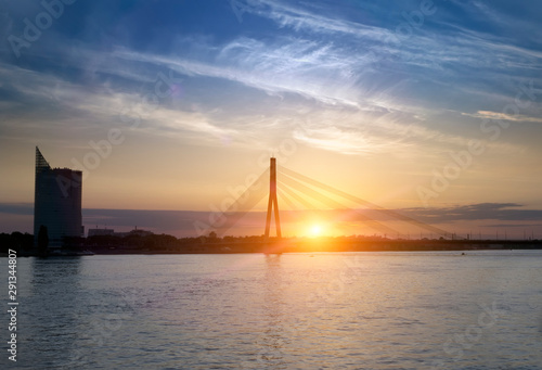 Riga, Latvia. Vansu suspension bridge over the Daugava River in the evening