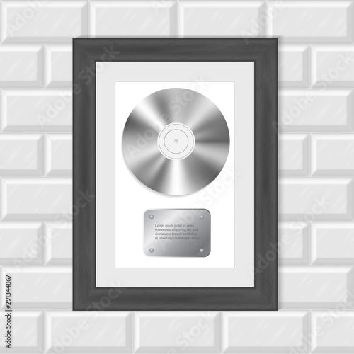 Platinum disc music award template for high audio record sales hanging on the white brick wall 3d illustration. Symbol of succes as a musician or music record company producer. Valuable achievement.