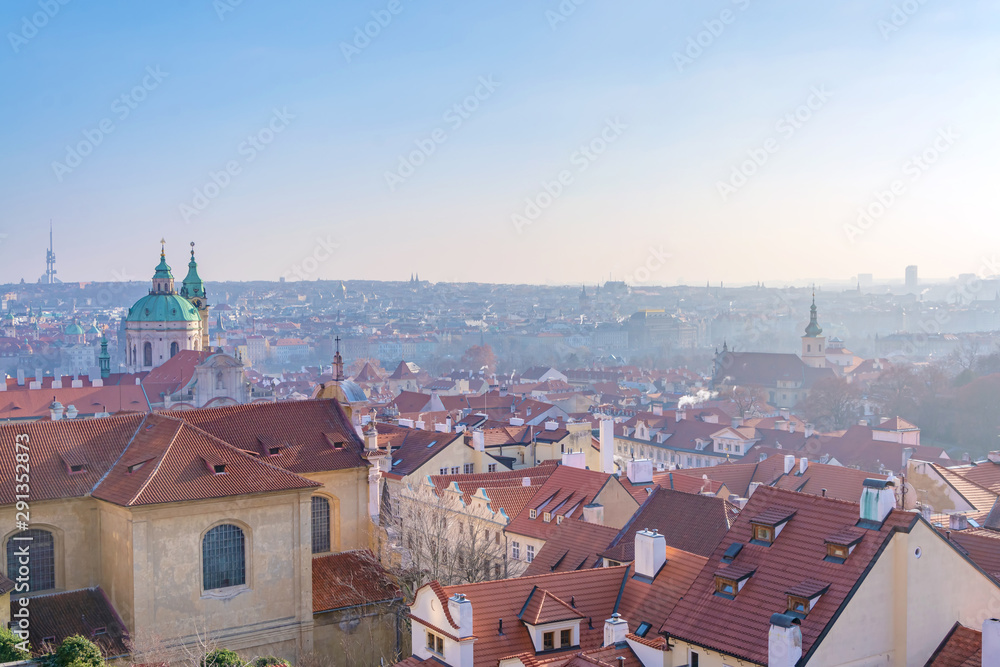 Panorama of Prague with church and red roofs