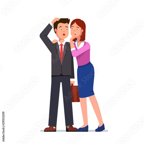 Woman whispering secrets in business man ear