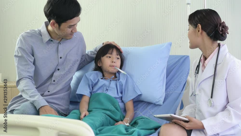 Asian doctor visit patient little girl and suggest physical examination at hospital. Concept of family, medical, healthcare and technology. Asian doctor visit patient little girl and suggest physical examination at hospital. Concept of family, medical, healthcare and technology.