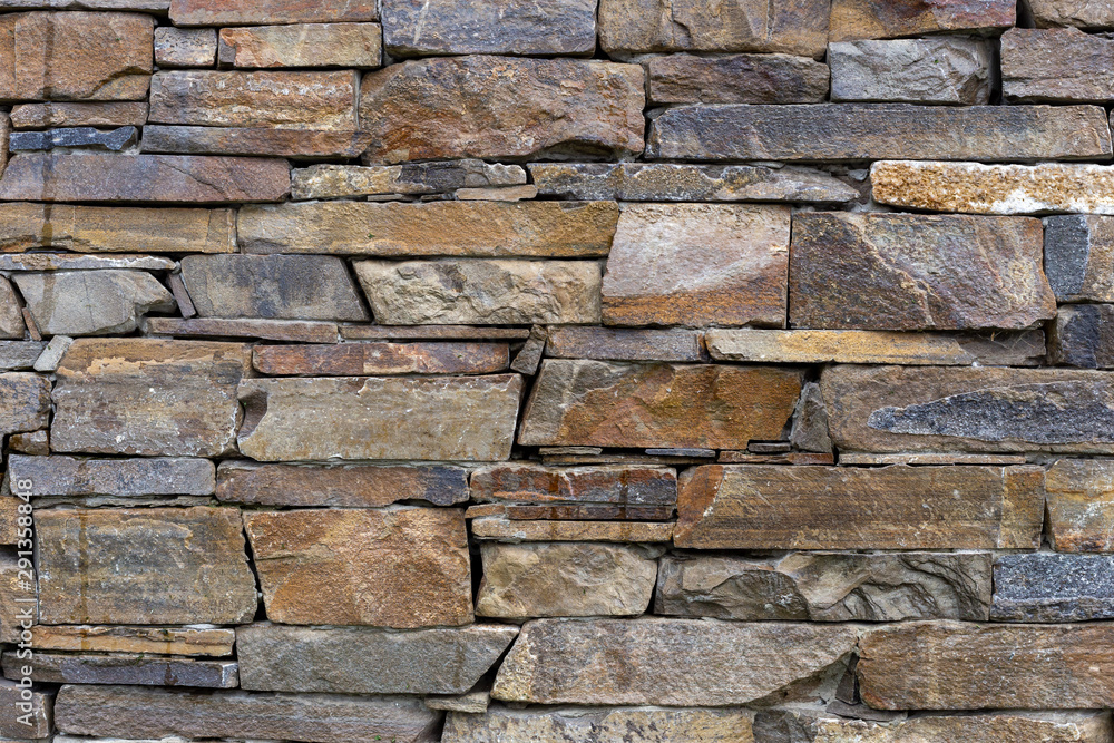 Stone wall for use as a background Stone wall for use as a background