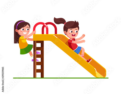 Girl sliding down slide and climbing up ladder