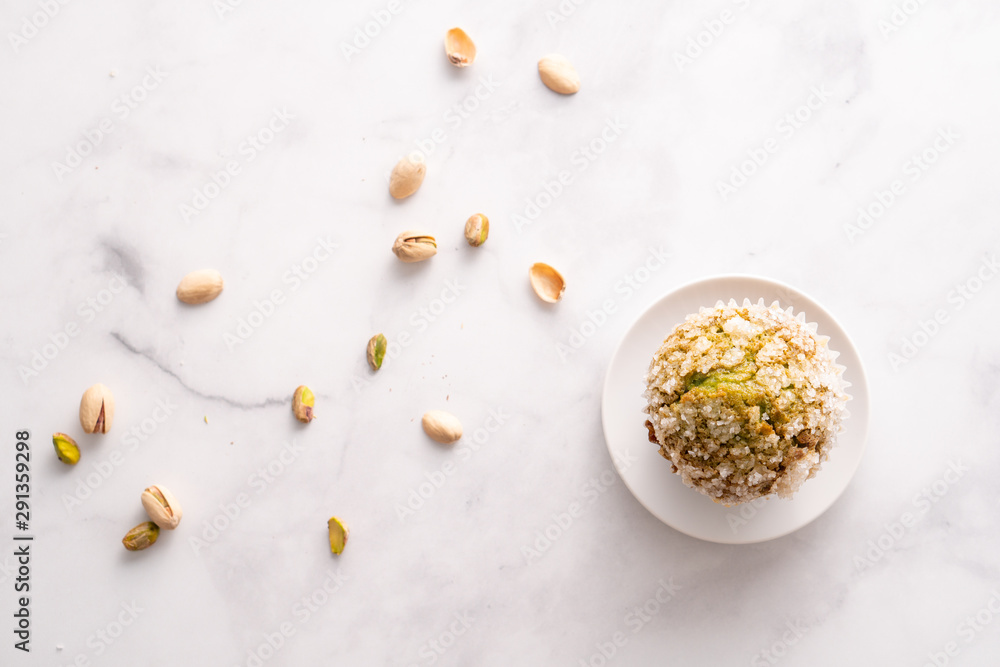 Homemade pistachio muffins with sugar crystals Homemade pistachio muffins with sugar crystals